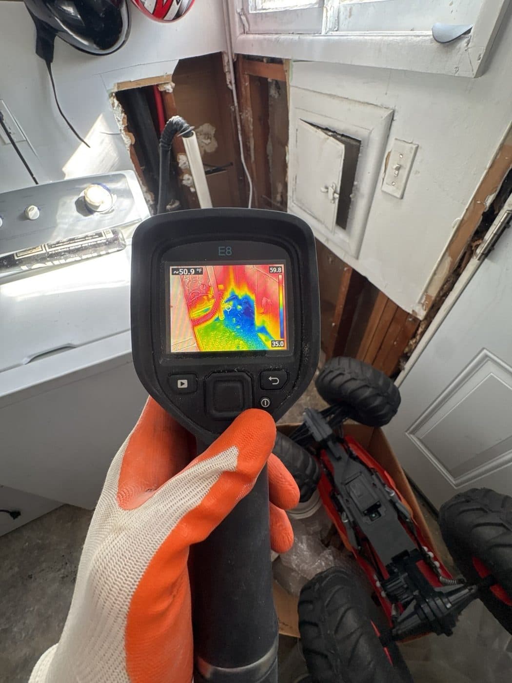 Thermal camera showing cold, wet areas inside a wall